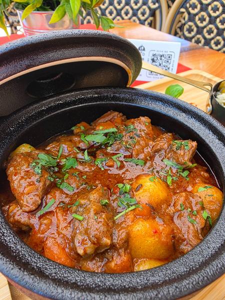 Beef Goulash with Dumplings and Chili Pepper Salad with Onion